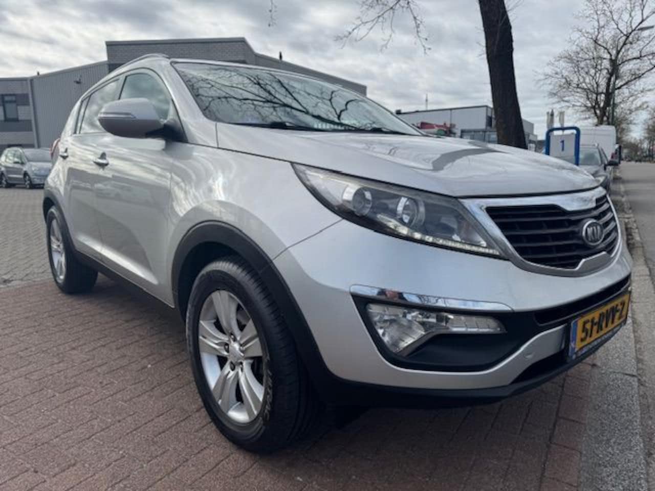 Kia Sportage - 1.6 GDI X-ecutive Plus Pack Airco/ECC,Cruisecontrol,Half Leder - AutoWereld.nl