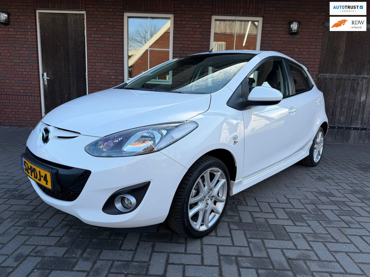 Mazda 2 - 1.5 GT-M | PDC| Cruise| Stoelverwarming| Airco - AutoWereld.nl