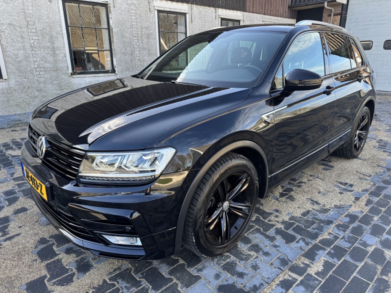 Volkswagen Tiguan - 1.4 TSI Con. Series R-line - AutoWereld.nl