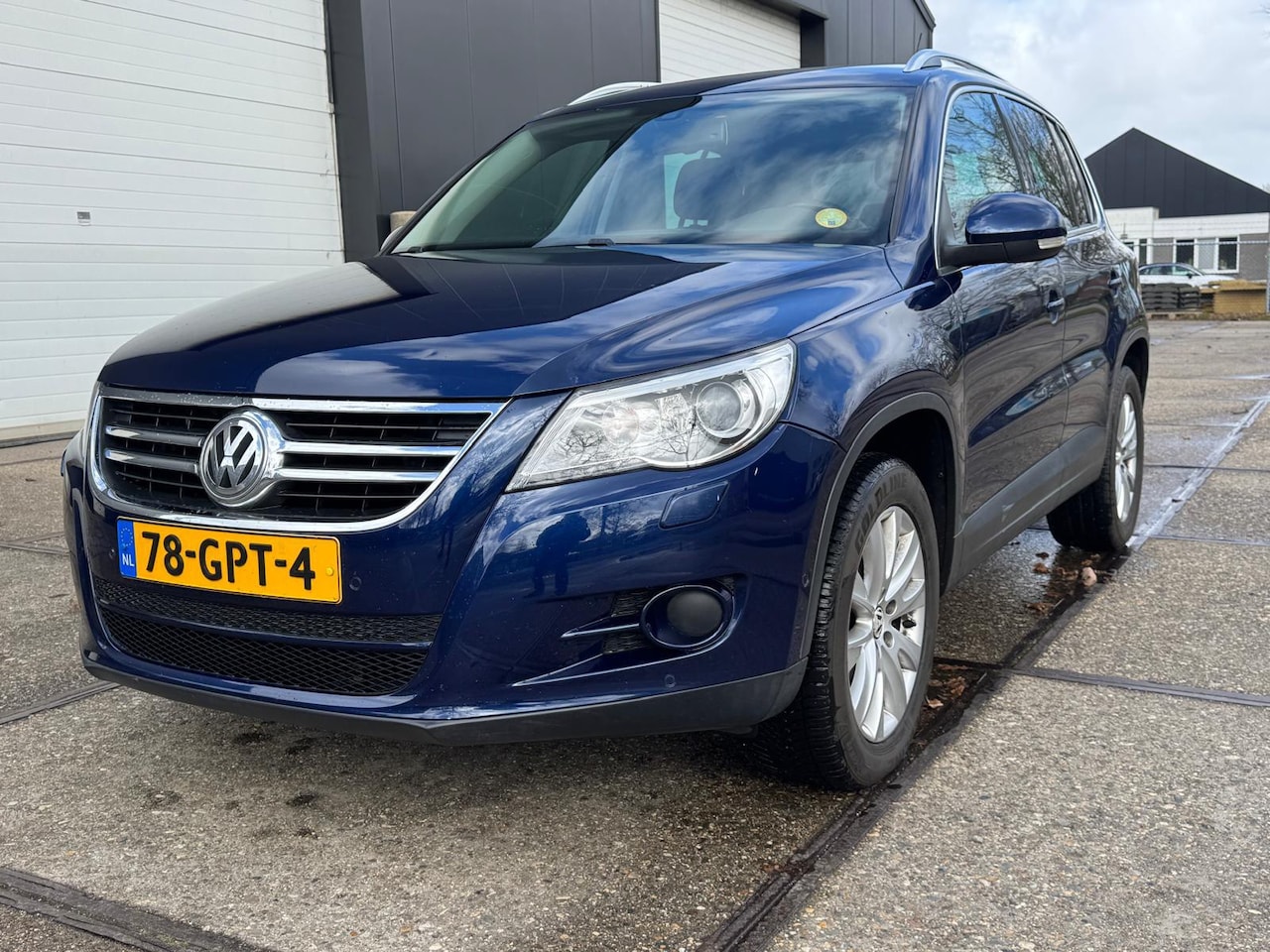 Volkswagen Tiguan - 2.0 TDI Sport&Style 4Motion AUTOMAAT PANO - AutoWereld.nl