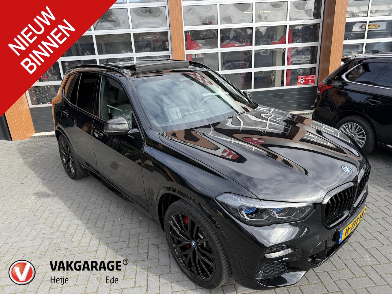 BMW X5 - xDrive45e High Executive | M-Pakket | Carbon Pakket | Bowers & Wilkins | Saphirschwarz met - AutoWereld.nl