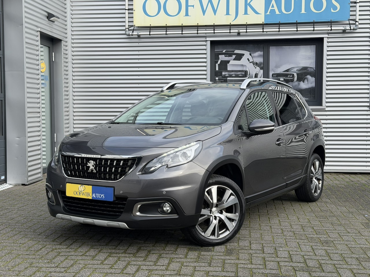 Peugeot 2008 - 1.2 PureTech Allure Clima Navi Camera CarPlay - AutoWereld.nl