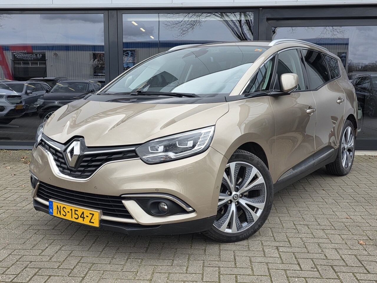 Renault Grand Scénic - 1.2 TCe Intens + 20inch LMV + CAMERA + KEYLESS + HEADUP + LED + HALF LEER + NAVIGATIE - AutoWereld.nl