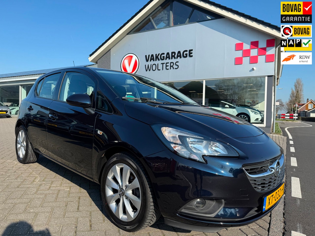 Opel Corsa - 1.4 Favourite RIJKLAARPRIJS! - AutoWereld.nl