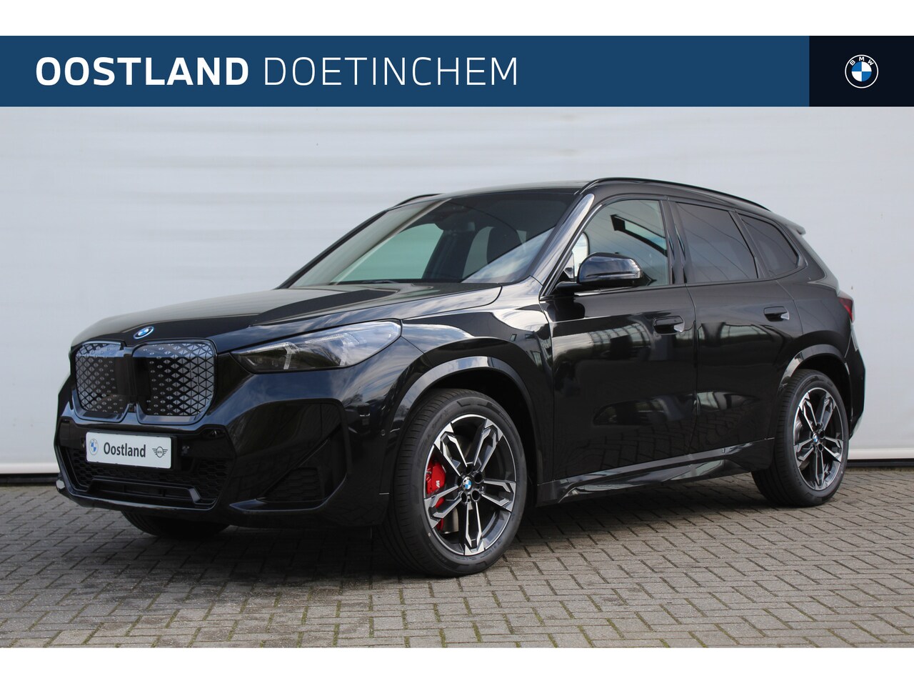 BMW iX1 - eDrive20 High Executive M Sport Automaat / Panoramadak / Trekhaak / Sportstoelen / M Adapt - AutoWereld.nl