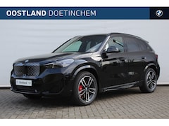 BMW iX1 - eDrive20 High Executive M Sport Automaat / Panoramadak / Trekhaak / Sportstoelen / M Adapt