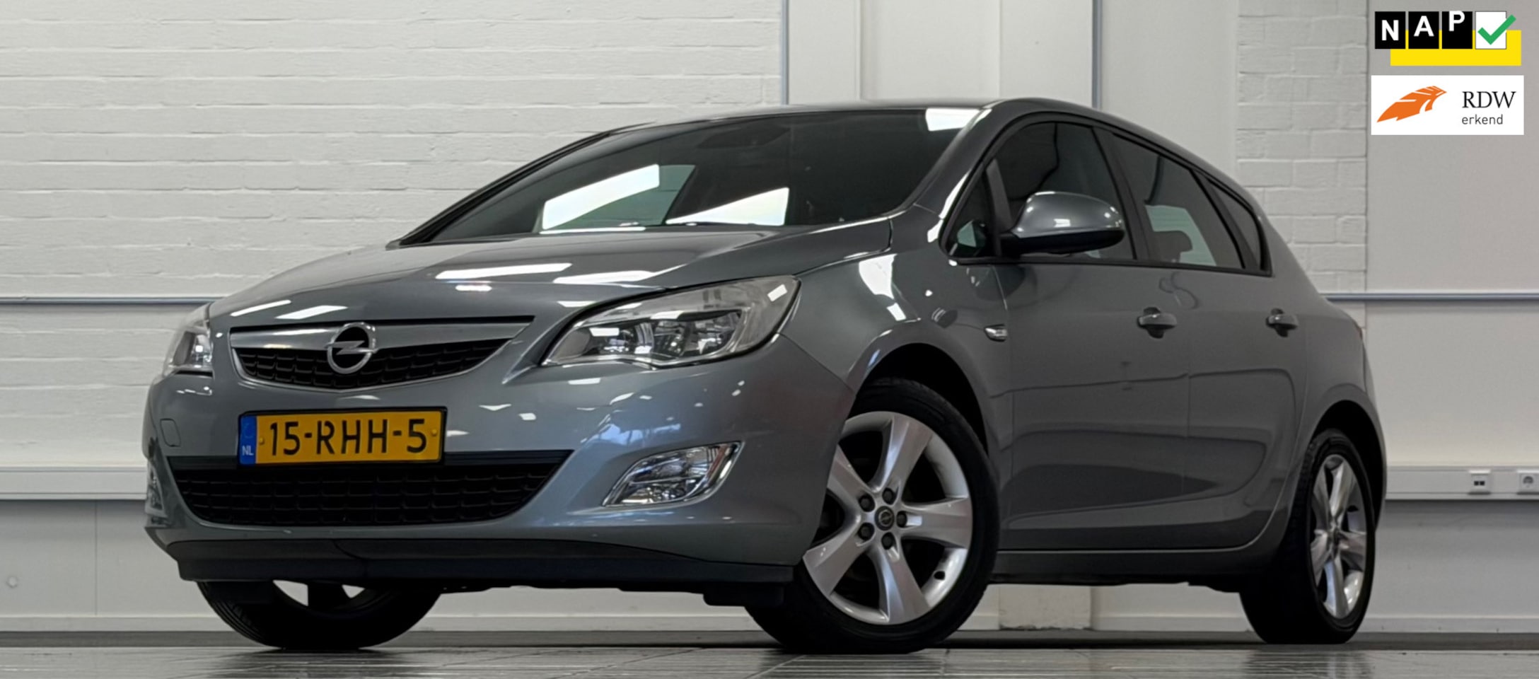 Opel Astra - 1.4 Turbo Edition 140pk 17"LM Trekhaak PDC Navigatie - AutoWereld.nl