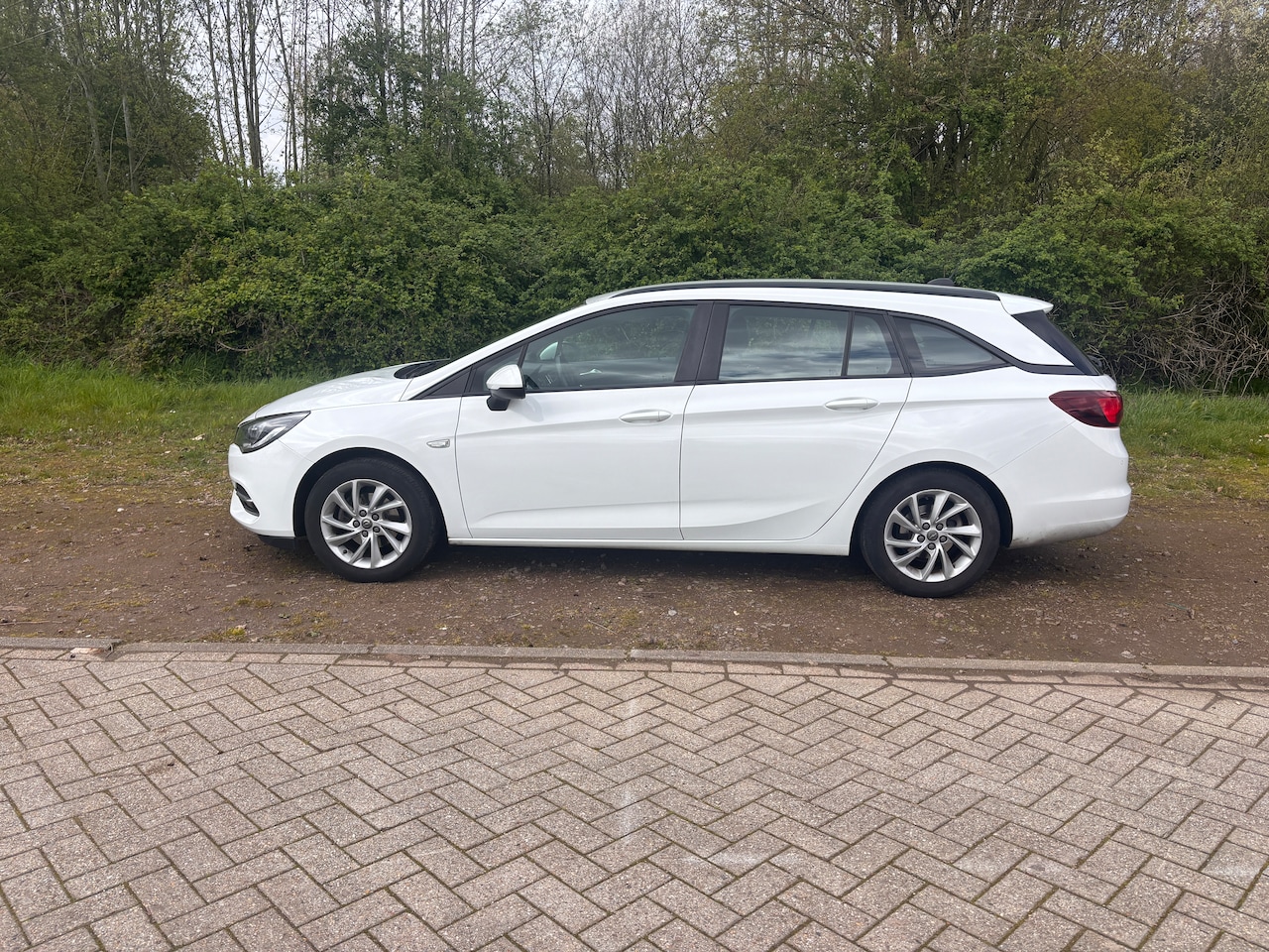 Opel Astra Sports Tourer - 1.2 Edition - AutoWereld.nl