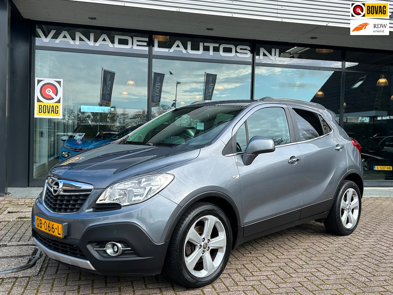 Opel Mokka - 1.4 T Cosmo 4x4 Leer Navi Park.Sens Cruise Stoel+Stuurverw. Dealeronderhouden! - AutoWereld.nl