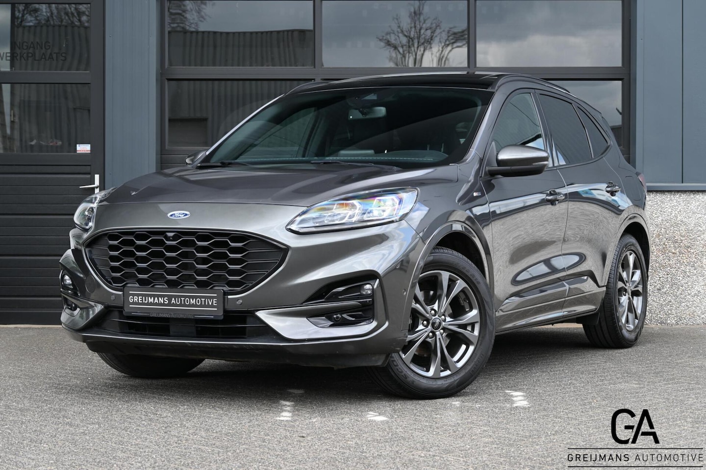 Ford Kuga - 2.5 FHEV ST-Line |Geen stekker|Panoramadak|CarPlay|Stuur + stoelverwarming - AutoWereld.nl