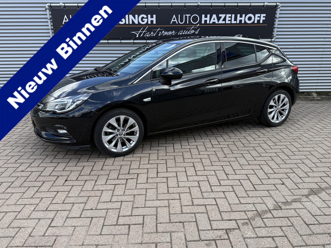 Opel Astra - 1.4 Business Executive 150pk | Clima | Camera | PDC V+A | Dodehoekdetectie | Navi | Cruise - AutoWereld.nl