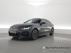 BMW i4 - eDrive40 M Sport Pro 84 kWh | S/K-Dak | Elek. Trekhaak | Shadowline | Widescreen | Adapt.