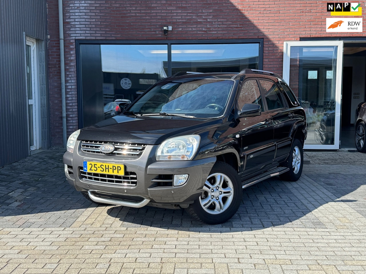 Kia Sportage - 2.0 CVVT X-treme 4WD | 4X4 | 1/2 Leer | Cruise | Navi | - AutoWereld.nl