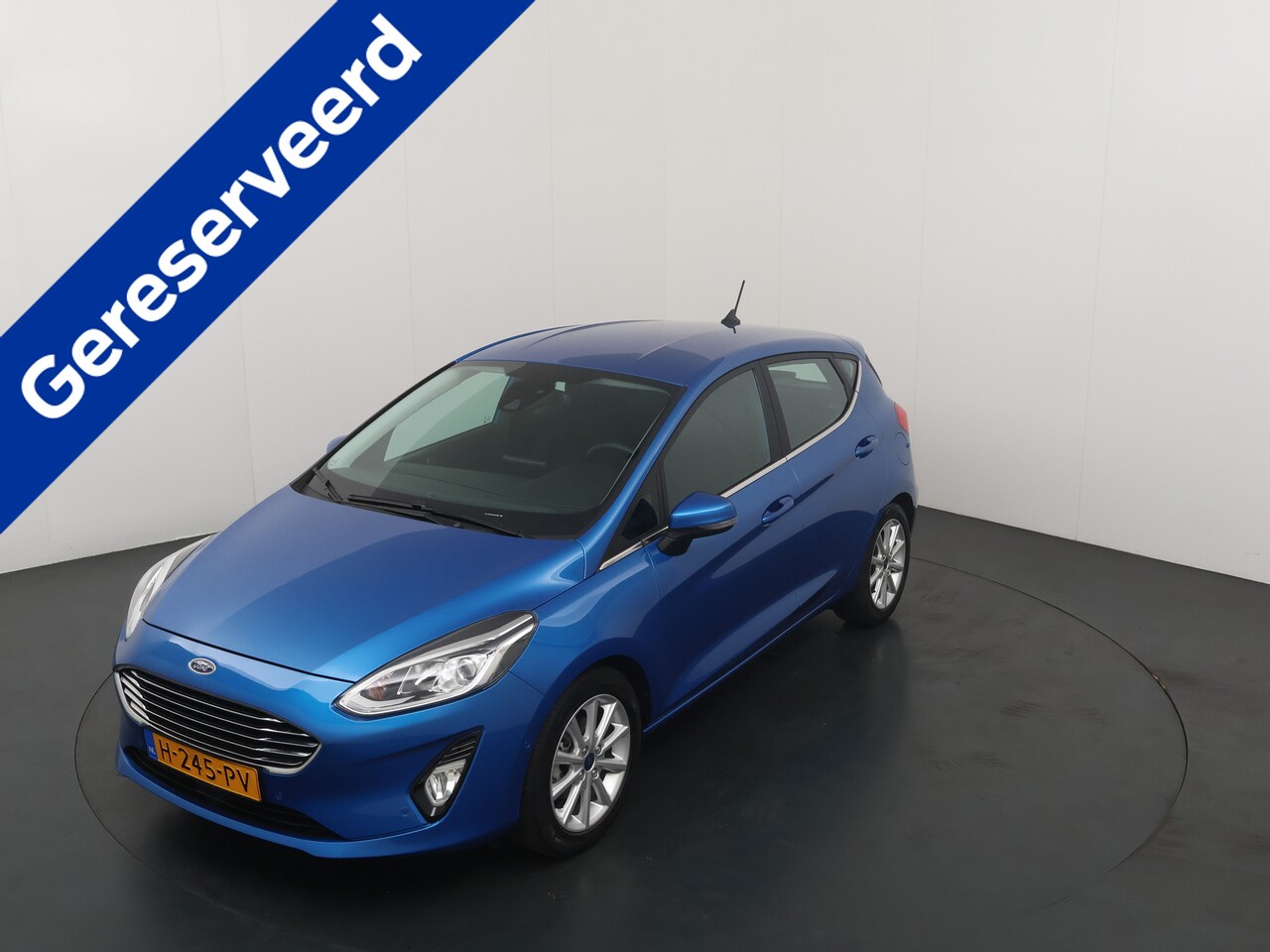 Ford Fiesta - EcoBoost Titanium | AUTOMAAT | Trekhaak | Winter Pack | Camera | Adapt. Cruise | LED | 1e - AutoWereld.nl