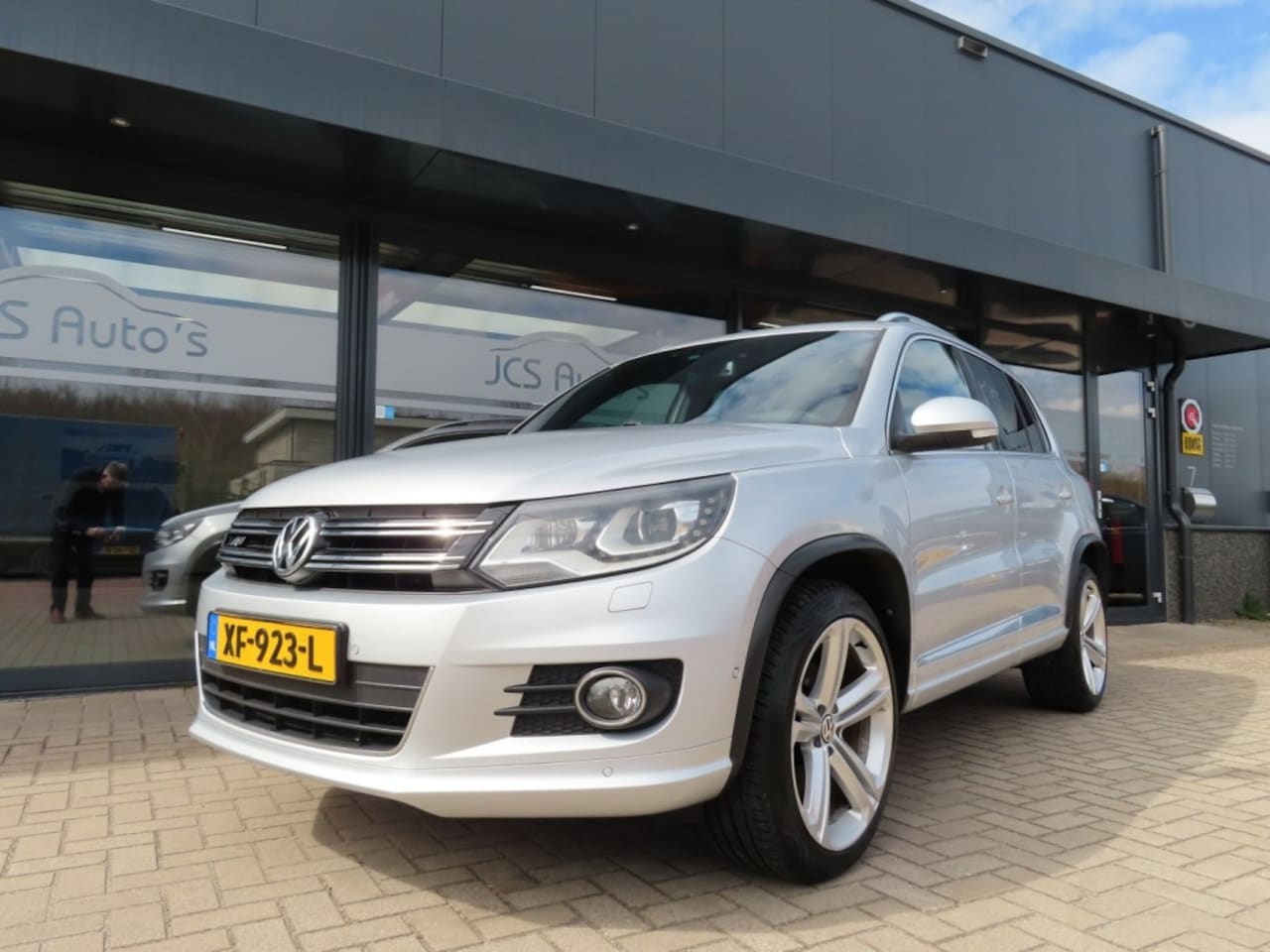 Volkswagen Tiguan - 1.4 TSI R-Line Edition Ecc Cruise Navi Pdc Trekhaak 2014 - AutoWereld.nl
