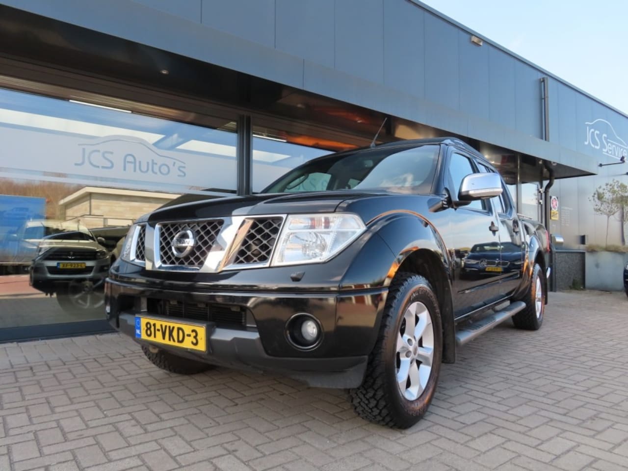 Nissan Navara - 2.5 DCi Double Cab Aut. 5 Persoons Ecc Trekhaak 2007 - AutoWereld.nl