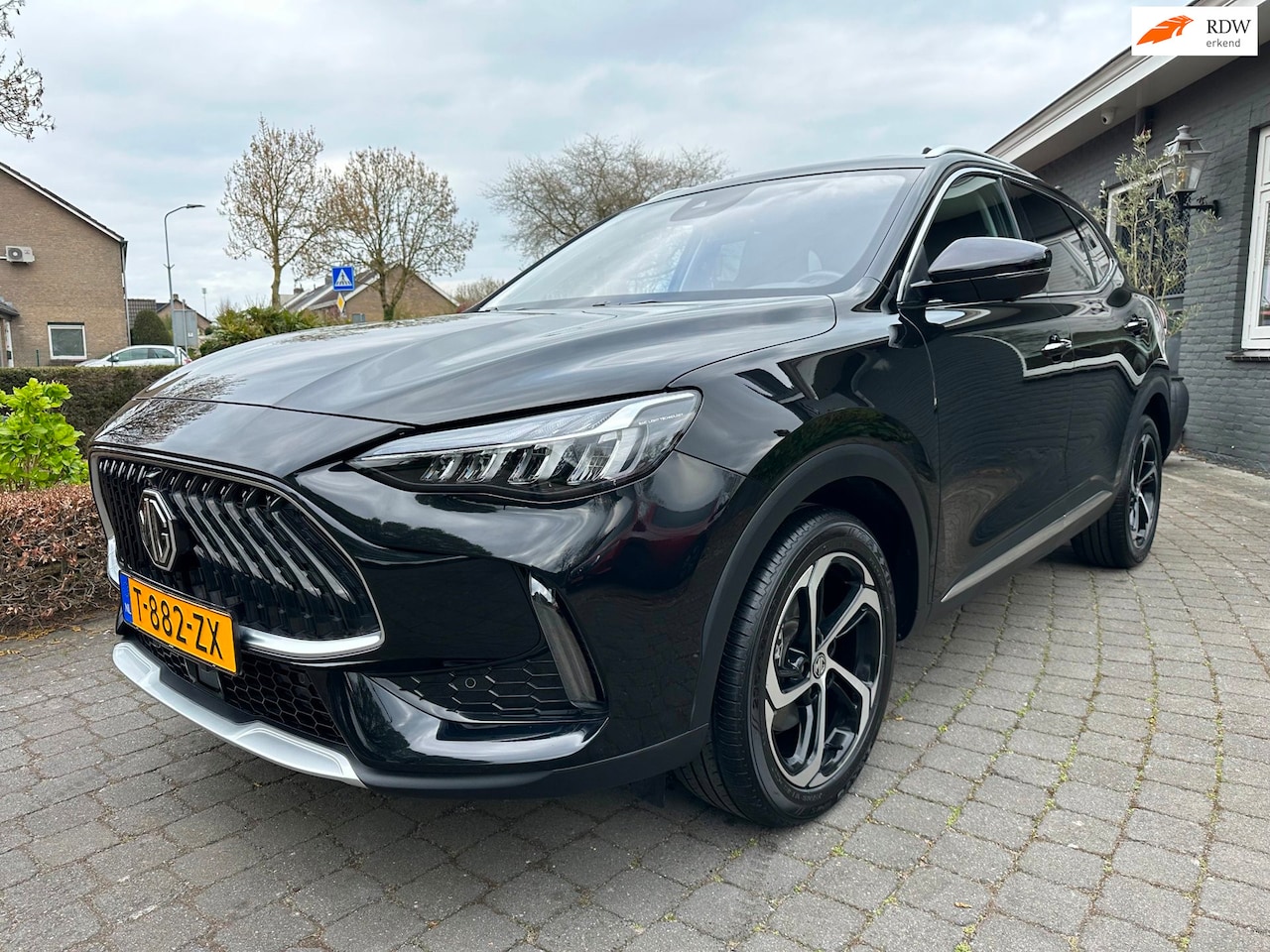 MG EHS - 1.5 TGDI Luxury 1.5 TGDI Luxury, Pano, Leder, Led, VOL! - AutoWereld.nl