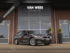 BMW 3-serie Touring - 320e High Executive | NL auto | BTW auto | Laser LED | Carplay | Sportstoelen | Sportstuur