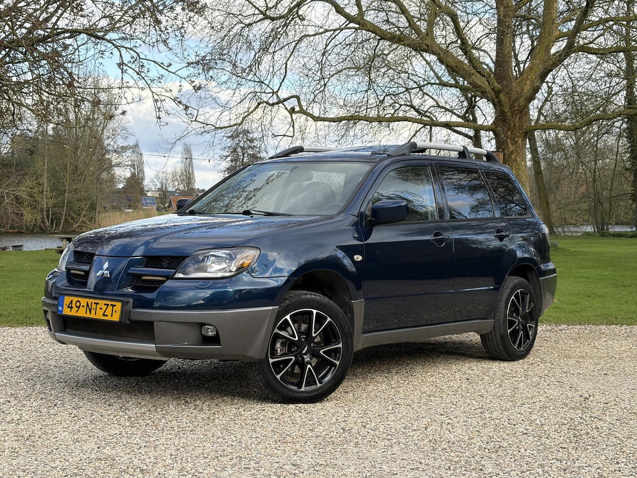 Mitsubishi Outlander Sport - 2.4 4WD Warrior, Airco, Schuifdak,Trekhaak - AutoWereld.nl