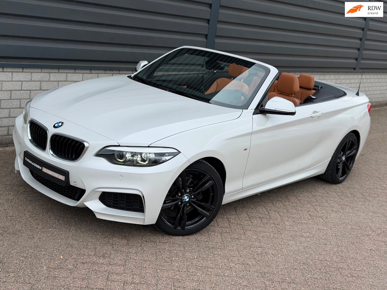 BMW 2-serie Cabrio - 218i High Executive M Sport Xenon Navi - AutoWereld.nl