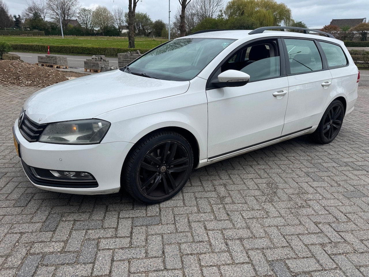Volkswagen Passat Variant - 1.6 TDI Trendline BlueMotion Navi - AutoWereld.nl