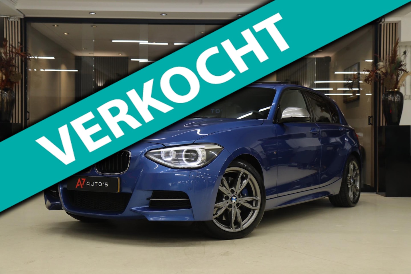 BMW 1-serie - M135i xDrive High Executive M PANO/CARPLAY/LEER/H&K/BOMVOL - AutoWereld.nl