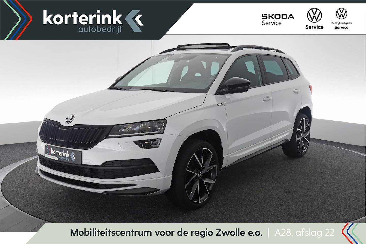 Skoda Karoq - 1.5 TSI ACT Sportline Business | Pano | Winterpakket | CANTON - AutoWereld.nl