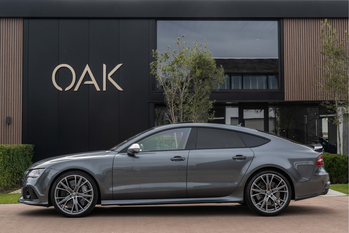 Audi A7 Sportback - 4.0 TFSI RS 7 | Navi | Leder | Memory | Schuifdak | B&O | Keramisch | Daytona Grijs - AutoWereld.nl