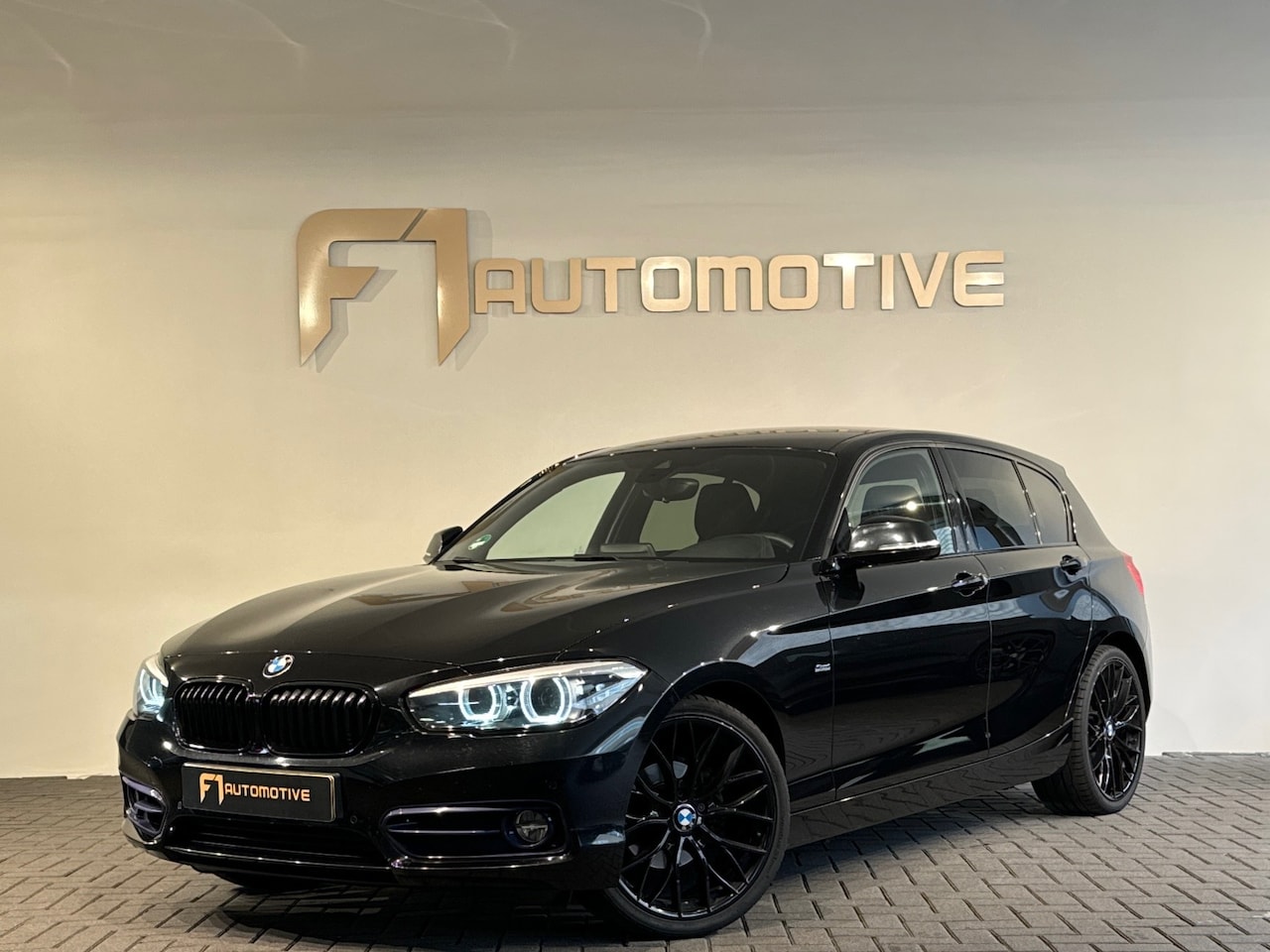BMW 1-serie - 118i Corporate Executive Black Pack|Ambiance|NAP - AutoWereld.nl