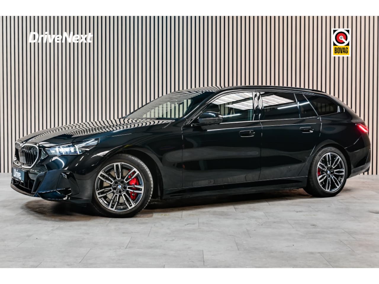 BMW i5 Touring - 40 xDrive | M-Sport PRO | HUD | PANO | HARMAN KARDON | STOELVERW - AutoWereld.nl