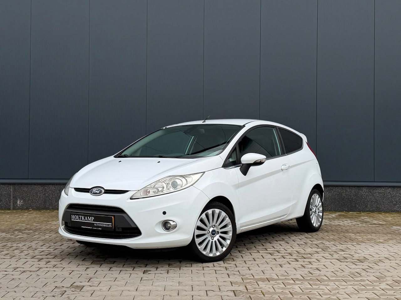 Ford Fiesta - 1.4 Titanium | CRUISE | CLIMA | XENON | KEYLESS | NIEUWE KETTING - AutoWereld.nl