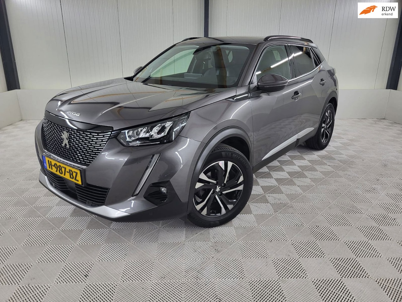 Peugeot 2008 - 1.2 PureTech Blue Lease Allure 1.2 PureTech Blue Lease Allure, Trekhaak - AutoWereld.nl