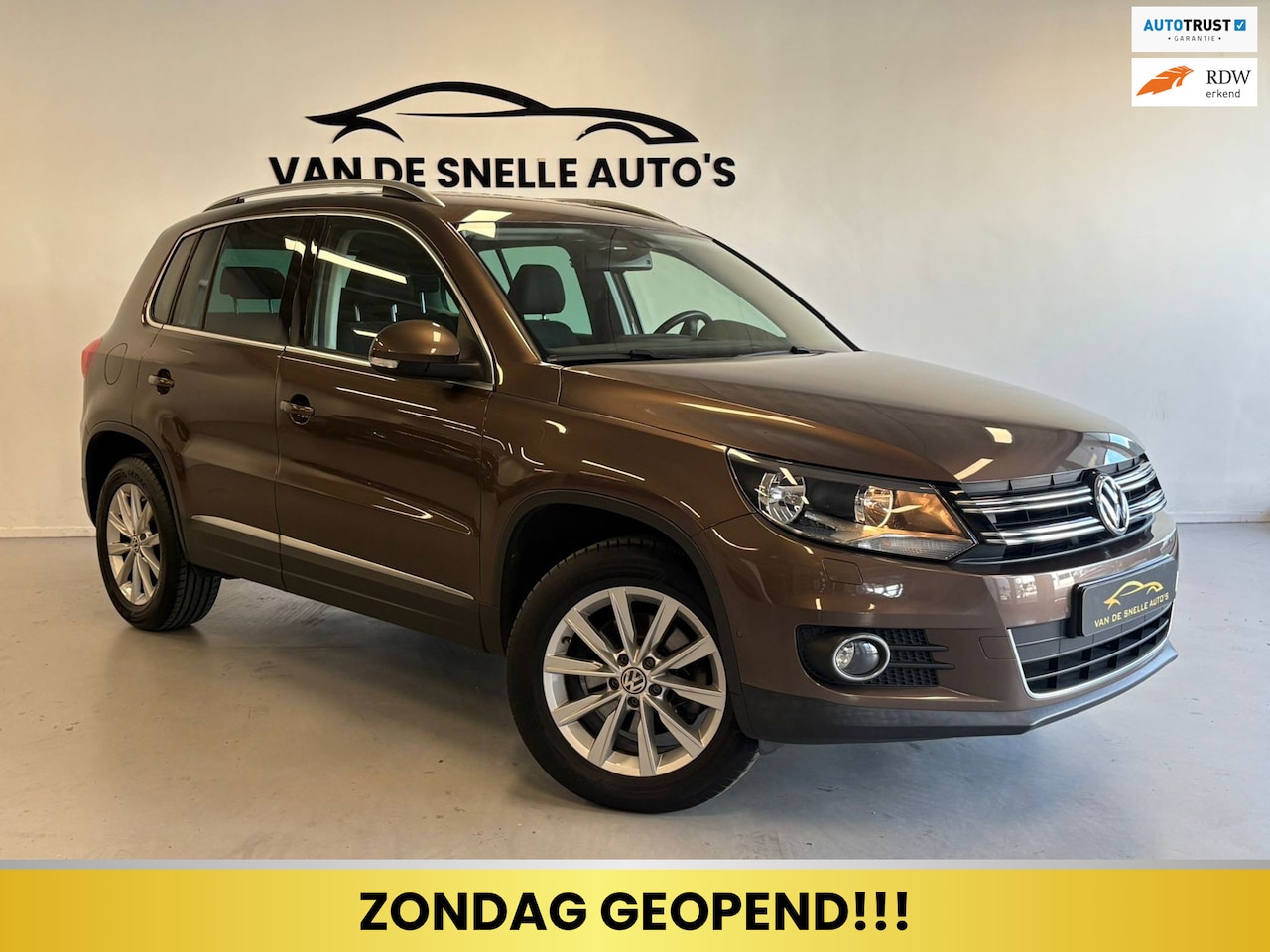 Volkswagen Tiguan - 2.0 TSI Sport&Style 4Motion DSGAUTOMAAT/TREKHAAK/ONDERHOUDSGESCHIEDENIS - AutoWereld.nl