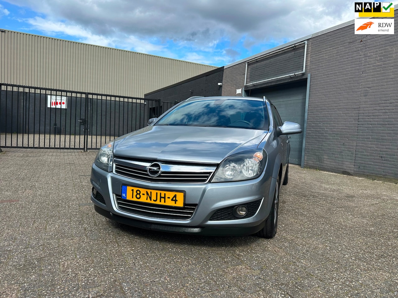 Opel Astra Wagon - 1.6 111 years Edition Airco Cruise Navi PDC Trekhaak APK NAP. - AutoWereld.nl