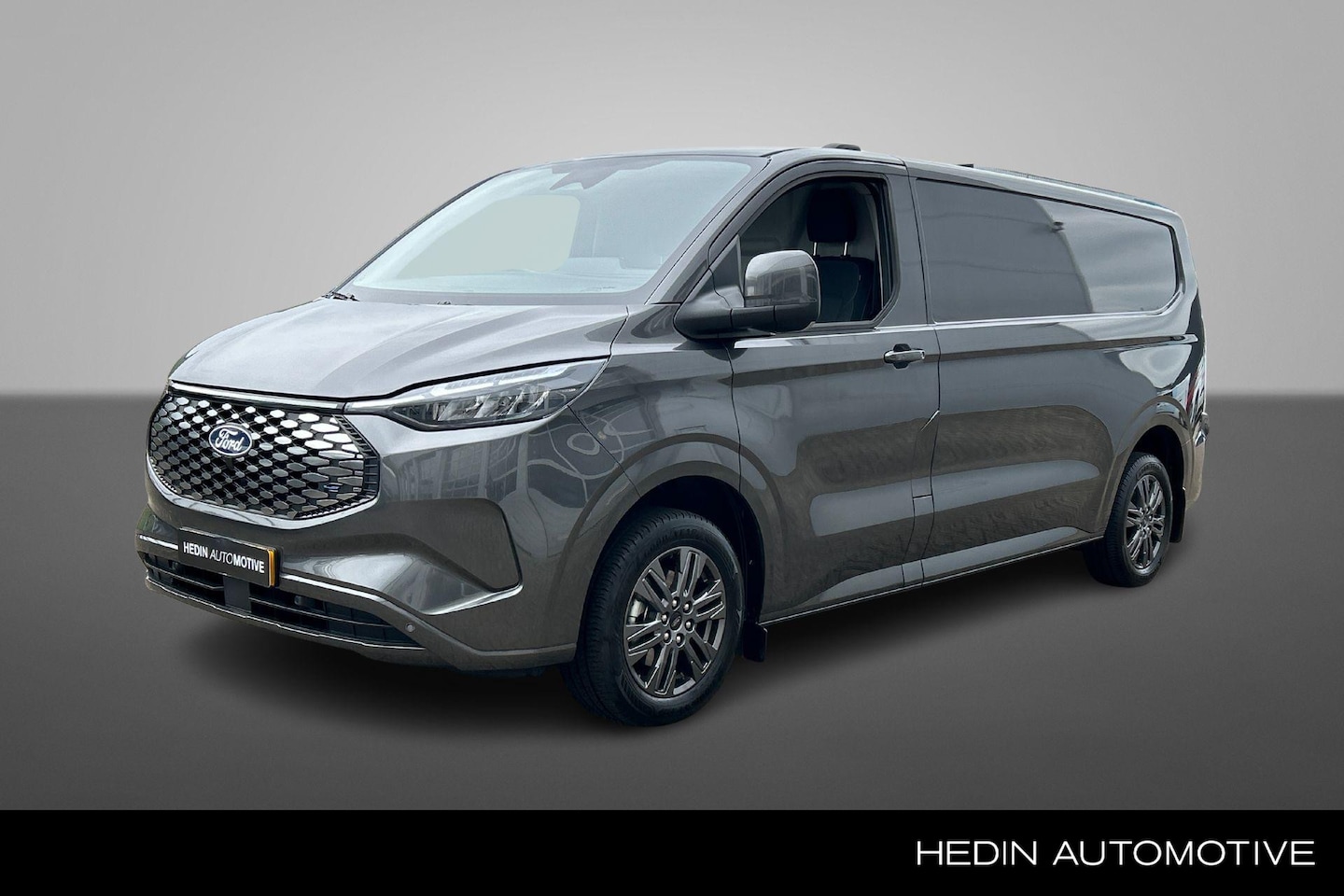 Ford Transit Custom - E-Transit 320 L2H1 Limited 65 kWh | Driver Assistance | 17" | Winter Pack | Trekhaak wegkl - AutoWereld.nl