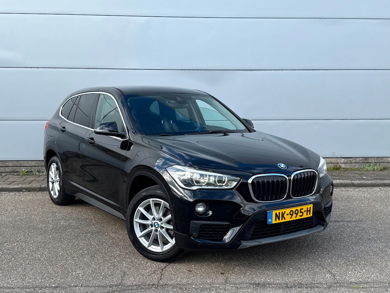 BMW X1 - SDrive18i Executive (bj 2017) XENON|NAVI|PDC V+A|101000 KM NAP - AutoWereld.nl