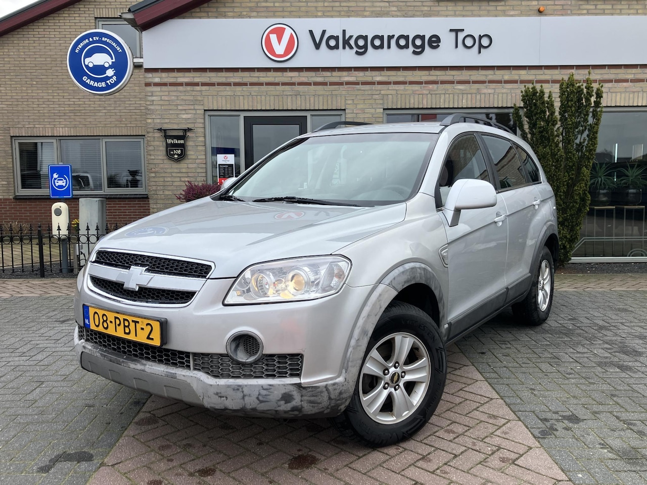 Chevrolet Captiva - 2.4i Style 2WD | Airco | Elektr. ramen + spiegels | NAP - AutoWereld.nl