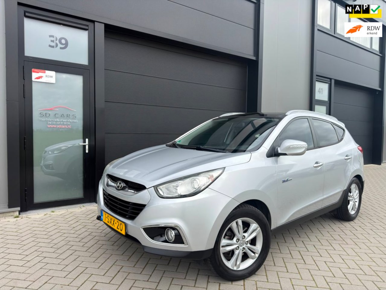 Hyundai ix35 - 1.6i GDI Style|Weinig km|Pano|Airco|Keyless|THK - AutoWereld.nl