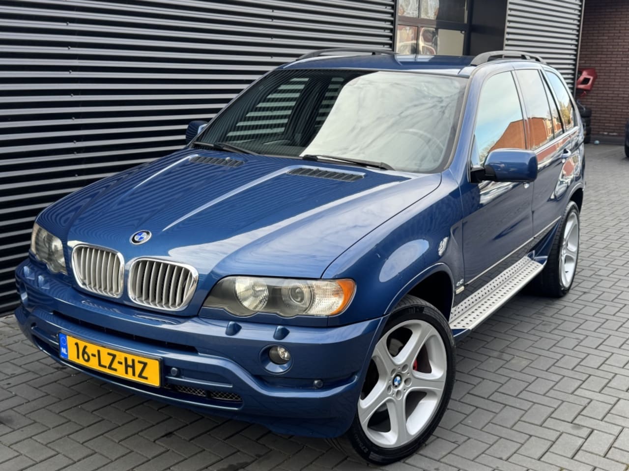 BMW X5 - 4.4i Executive| ESTORIL BLUE| LEER| NAP| NAVI| 4X4 - AutoWereld.nl