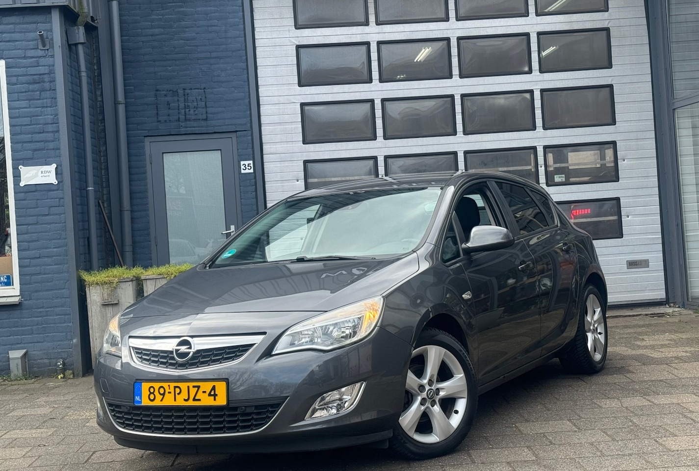 Opel Astra - 1.4 Turbo Edition | Navi | Cruise | PDC - AutoWereld.nl
