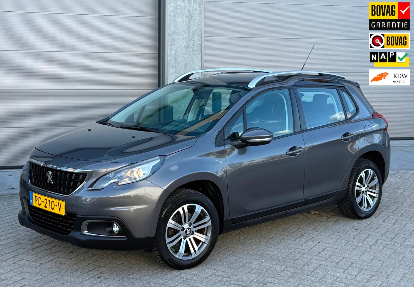 Peugeot 2008 - 1.2 VTI 110pk AUT 2017 Grijs NAVI|NAP|1E EIG. - AutoWereld.nl