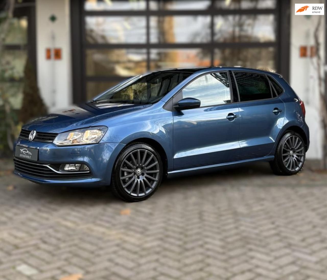 Volkswagen Polo - 1.2 TSI Highline 17" Panoramadak - AutoWereld.nl