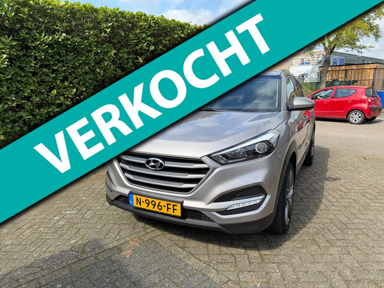 Hyundai Tucson - 1.6 GDi i-Motion Trekhaak / Navigatie - AutoWereld.nl