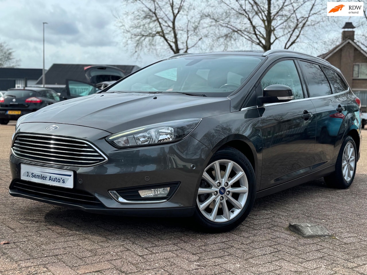 Ford Focus Wagon - 1.0 Titanium NAVI CAMERA CRUISE STUUR/STOELVERW NIEUWE DISTRIEM - AutoWereld.nl