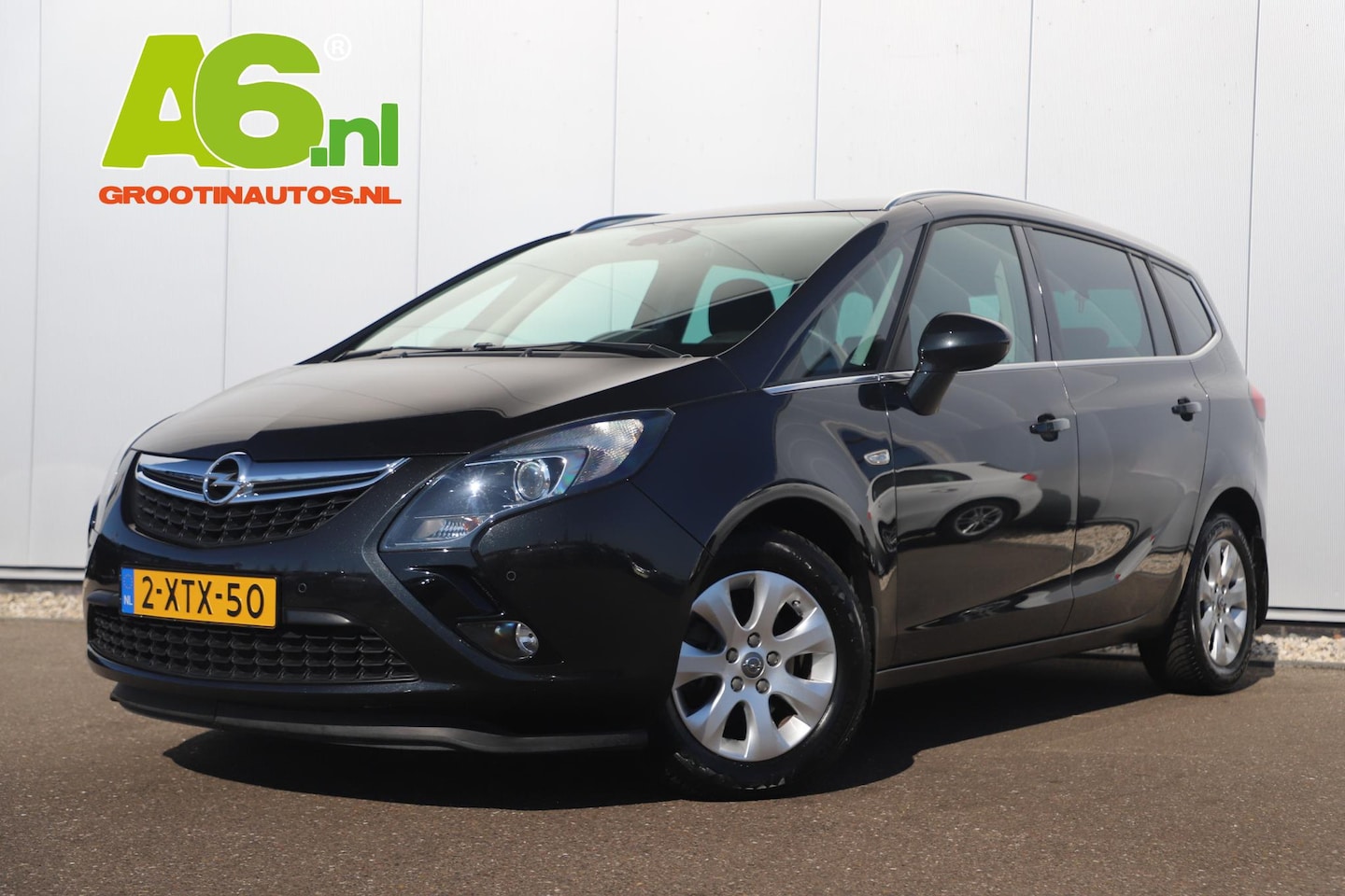 Opel Zafira Tourer - 1.4 Business+ 140PK Automaat Trekhaak Navigatie Achteruitrijcamera Clima Cruise Parkeersen - AutoWereld.nl