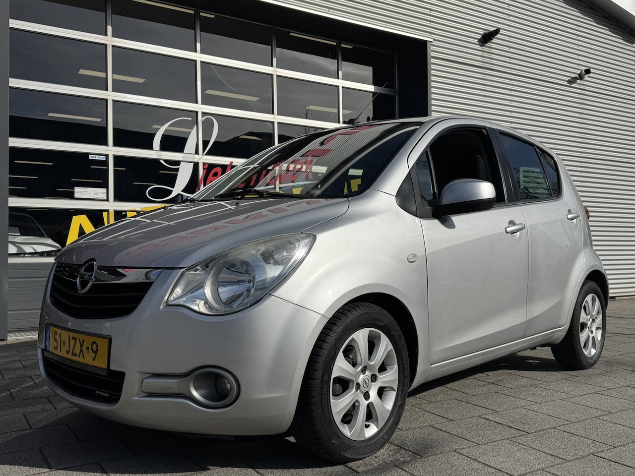 Opel Agila - 1.0 Enjoy - 5Drs I Airco I Sport velgen I Comfort pakket I 80.000 KM - Dealer onderhouden - AutoWereld.nl