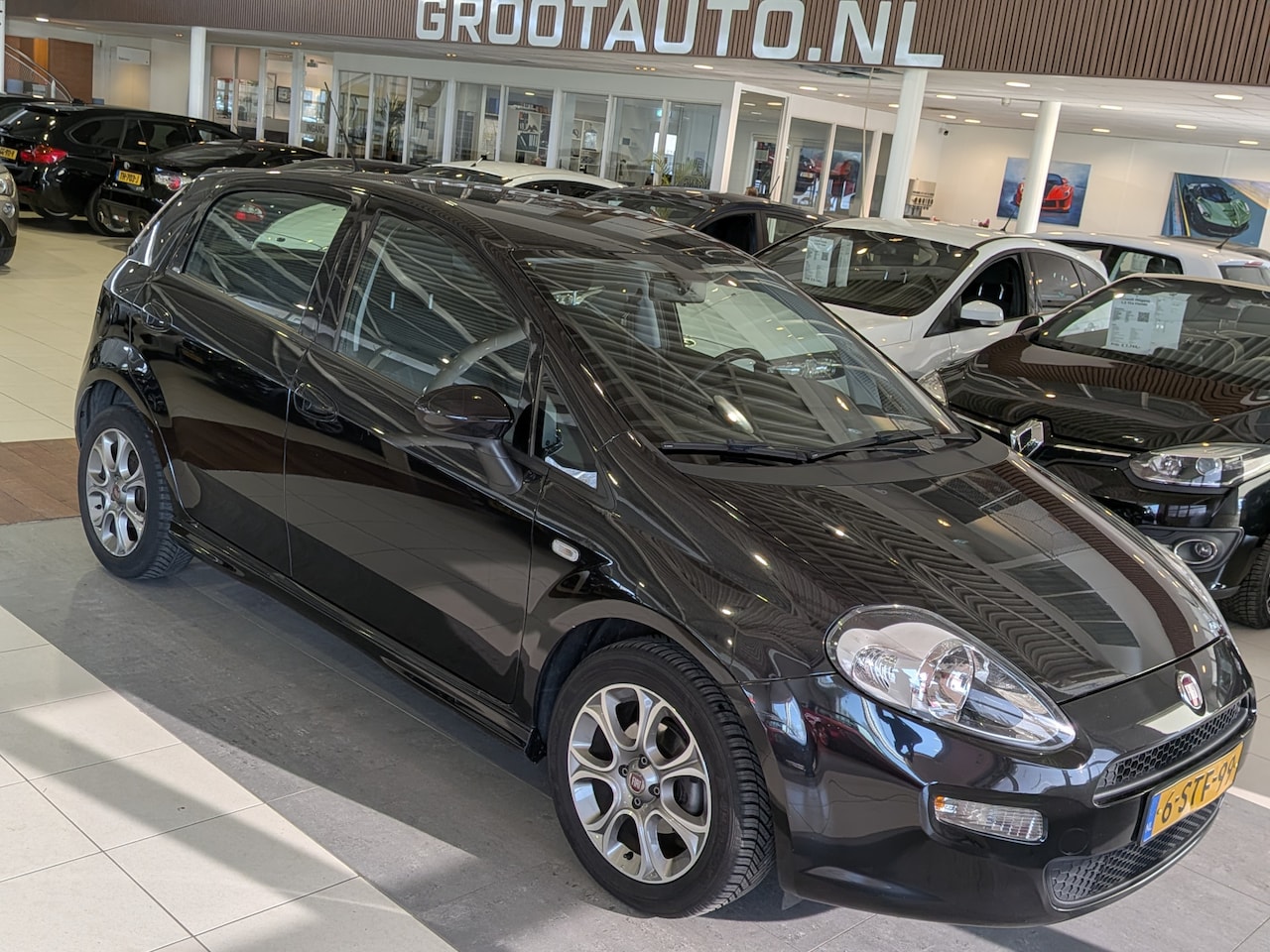 Fiat Punto Evo - 0.9 TwinAir Edizione Cool Airco, Cruise Control, Stuurbekrachtiging - AutoWereld.nl