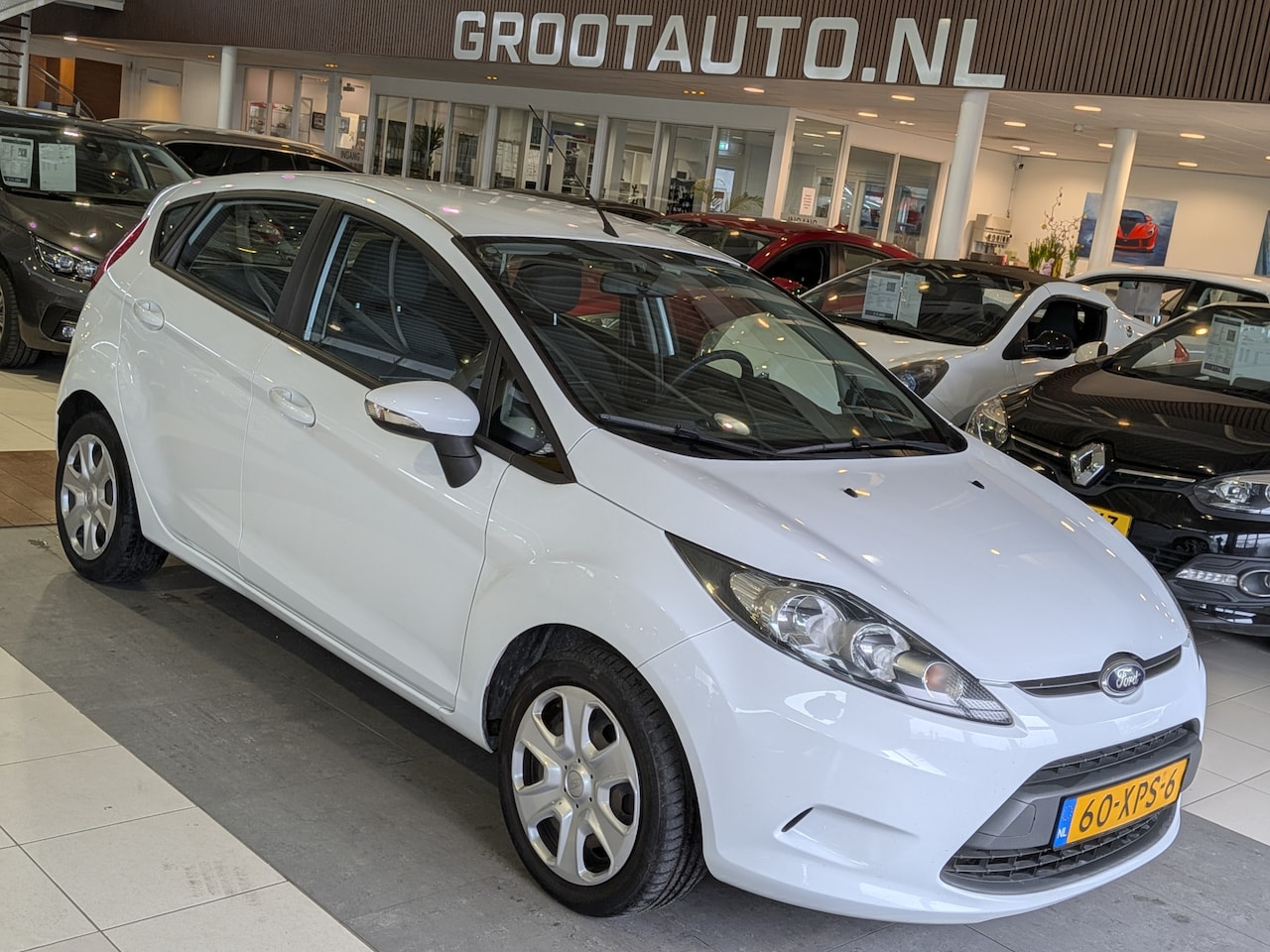 Ford Fiesta - 1.25 Champion Airco, Stuurbekrachtiging - AutoWereld.nl