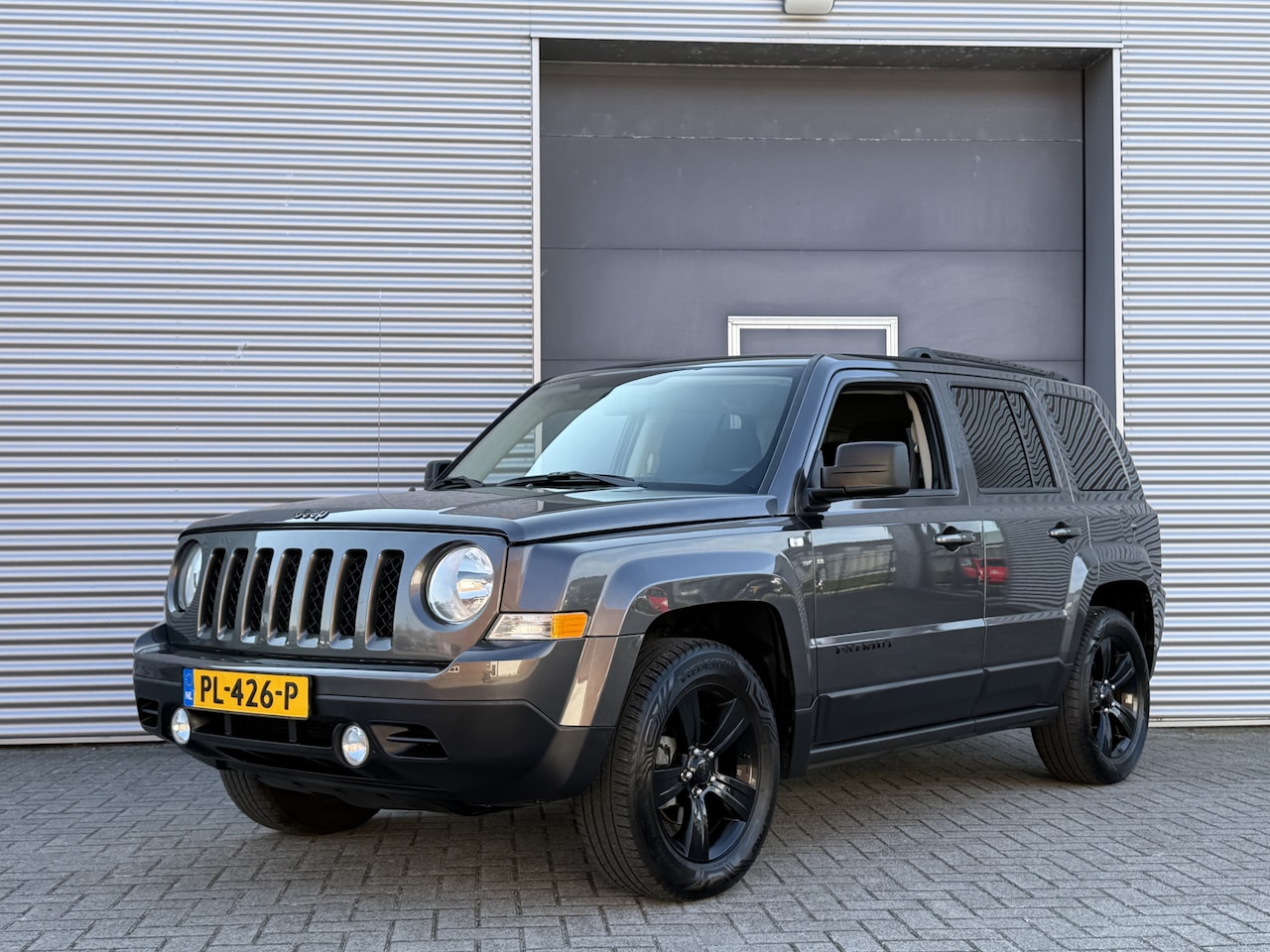 Jeep Patriot - 2.0 Altitude I Automaat I Airco I Cruise I Trekhaak - AutoWereld.nl