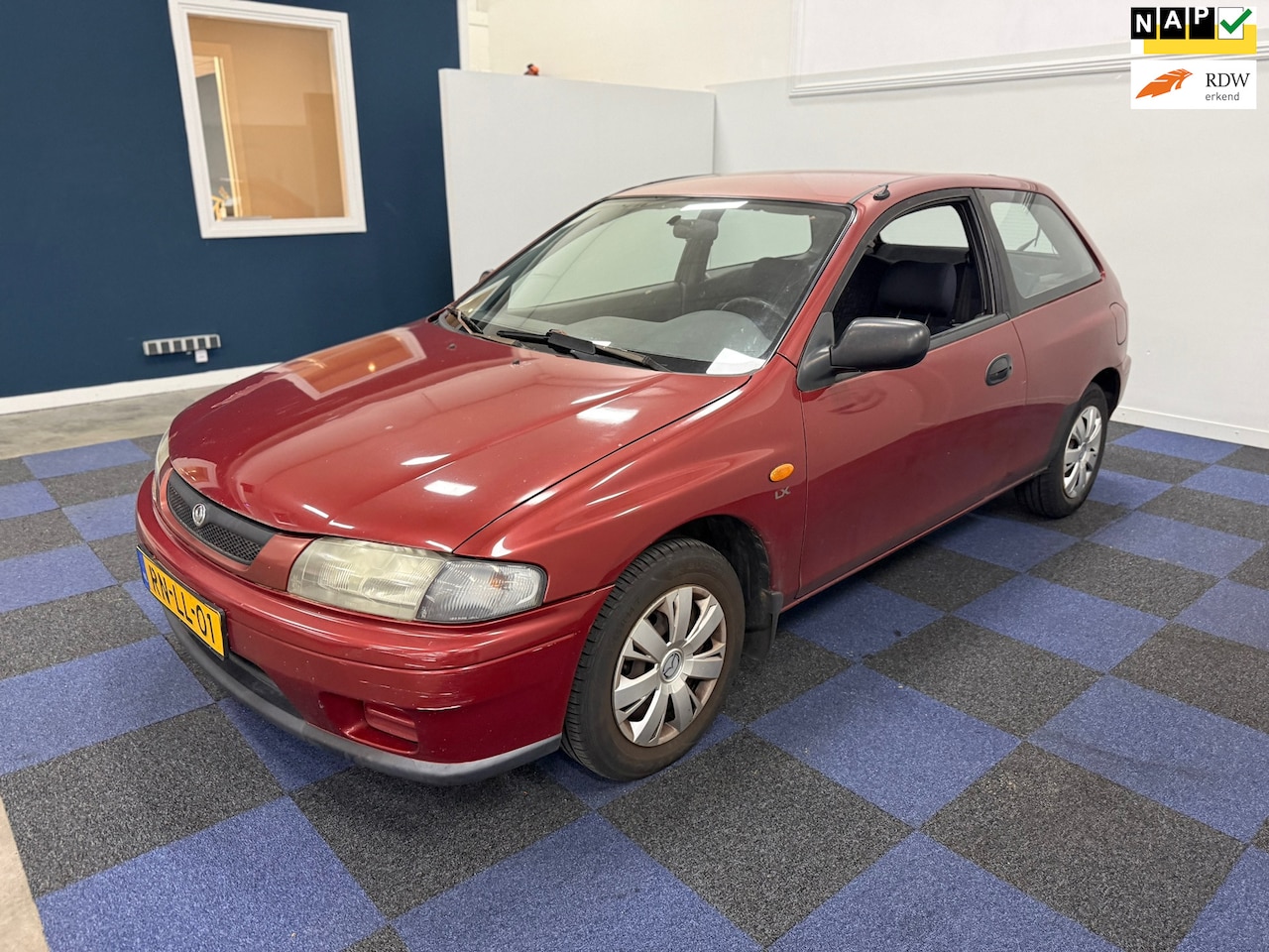 Mazda 323 - 1.5i P LX / RIJDT SCHAKELT GOED / INRUIL VERKREGEN - AutoWereld.nl